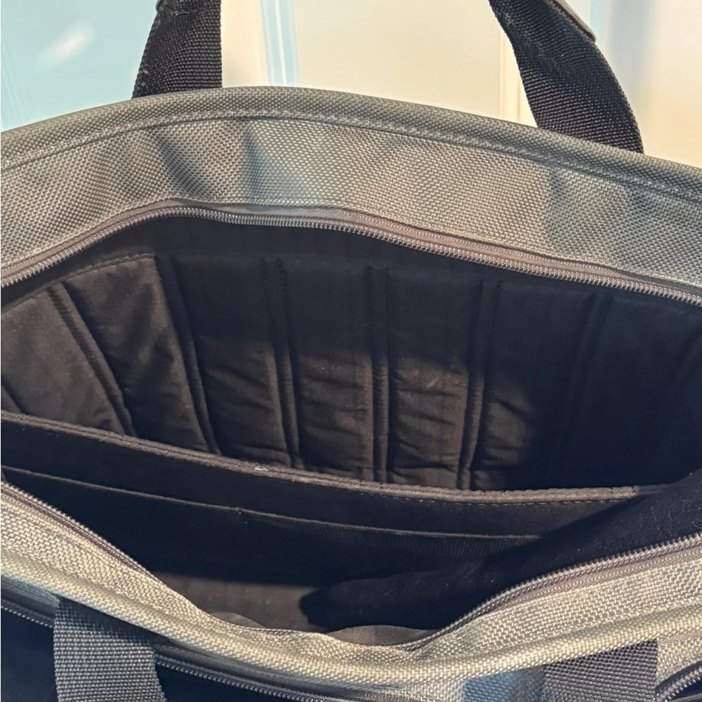 TUMI Men’s Travel Briefcase Leather handles